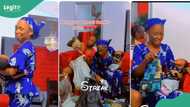 Mother surprises daughter with foodstuffs during omugwo visit, video shows her rocking the baby