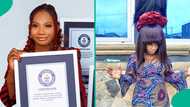 Nigerian lady sets Guinness World Record for tallest wig measuring 50.42ft