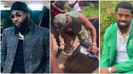 After performing at Davido’s concert, British rapper Tion Wayne distributes new clothes to a Lagos community