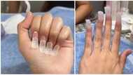 Lady fixes nails inside out so she can type better on computer keyboard, netizens vote down style
