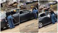 "Bro see your girlfriend": Lady on bike hops into car after she receives invite from man in video