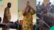 FUOYE lecturer kneels and prays for students who gave him unexpected gifts in class, sparks buzz
