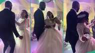 Lady who is a lover of Indian music dances to it alongside her husband on their wedding day