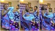 "Today is our baby naming ceremony": Happy Nigerian mum in wrapper dances with her newborn in video