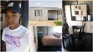 Young man arranges his house built with iron sheets well, puts fine dinning set, kitchen cabinets in photos