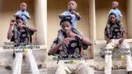 "Na your papa I for carry?" Man places smallish dad on his shoulder to dance, fires people dragging him