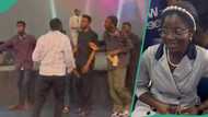 Happy church members dance energetically and guide Nigerian lady about to get married to podium
