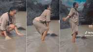"Are you a river goddess?" Gorgeous fair lady dances like 'mami water' at stream, video causes stir