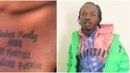 Naira Marley rendered speechless again as die-hard female fan tattoos his name on her chest