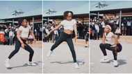She's flexible: Young girl in crop top shows hot moves with legs apart as she dances before students in video