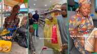 Kind man surprises groundnut seller, gifts her bag of rice, oil, milk, other provisions