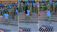 "Why is the guy staring?" Shy female corps member shows off smooth legwork in video, men focus on her