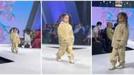 Young model steals the show with impressive runway skills, sparking mixed reactions online