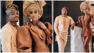 Thinking outside the box: Lady pairs pantsuit with gele in new photos, wows internet users