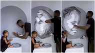 Massive reactions as this artist uses little girl's hands to make great painting (video)