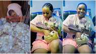 Nigerian hairdresser causes stir in video as she flaunts bag of money she made during freedom party