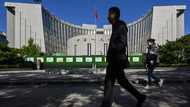 China's central bank cuts two key rates to boost economy