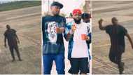 My oga get money: Davido's logistics manager Israel DMW screams at airport with bell in his hand, many react