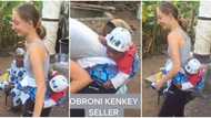 "Sorry for this child": Moment Oyinbo lady nearly dropped baby as she tries to back him, scary video causes stir