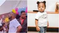 Video shows Davido breathing hard as he struggles to get Ifeanyi to stay in one place at a party
