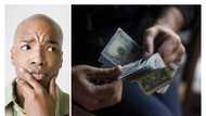Trouble for naira as external reserves plunges to $33.92 billion as naira falls to N900 to a dollar
