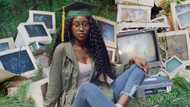 So cute: Huge reactions as lady shares adorable graduation photo of herself posing in front of many computers