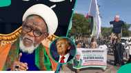 Tension in Kano as Shi’ite members protest Trump’s invasion threat, Drag US flag on ground
