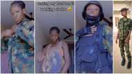 "Omo, you try": Reactions as pregnant Nigerian lady rocks her hubby's army uniform and boots, video stuns many