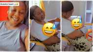 "Milk is not coming out": Drama as grandmother breastfeeds her grandchild, video causes stir