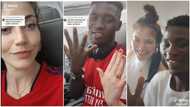 Oyinbo lady flaunts her wedding ring & Nigerian man inside aeroplane, cute video stirs reactions