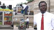 Corporate fruit seller dresses like bank manager as he pushes show glass on the streets of Benin, reveals why people patronise him (photos)