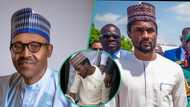 Late Buhari’s son Yusuf honours father with final burial rites on grave, video trends: "So humble"