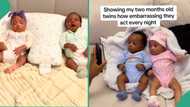 Twin babies react after their mother shows them video of how they cry in the night