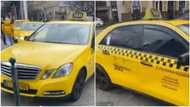 This is what yahoo boys do rituals for: Man reacts after seeing Mercedez Benz being used as taxi in Europe