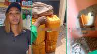 Businesswoman cries as thieves steal 44 gallons of palm oil from shop, forgets bag while fleeing