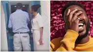 Video of lady 'glued' to man withdrawing from ATM gets people talking on social media