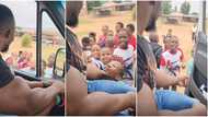 "He will never be bullied": Man with big muscles goes to drop son in school, kids gather around him in Video