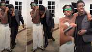 "Are they brothers?" Man poses with Shalipopi in video, netizens question striking resemblance