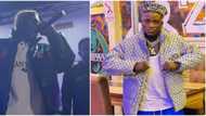 Portable cries out as crowd steals his phone, gold chains, & others after jumping on them during performance