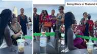 Oyinbos wishing they have black skin, queau for photos around lady, admires every bit of her endowed beauty