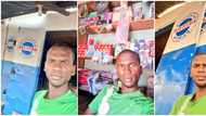 Young man opens spare parts business, takes selfie with his shop, Nigerians react