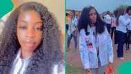 Nigerian graduates celebrate uniquely on a moving truck waving with joy in white outfits