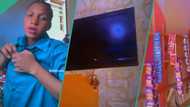 "Plasma for empty shop?" Lady with few goods in her store mounts costly television, video trends
