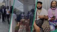 Naira Marley, Sam Larry spotted giving bag of rice, other foodstuff to the needy in video