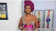 Asoebi style gone wrong: Nigerians criticize wedding guest over revealing dress