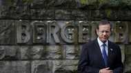 Israeli president retraces father's footsteps at Nazi camp