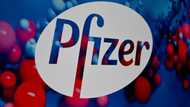 Pfizer reports loss as Covid-19 revenues shrink