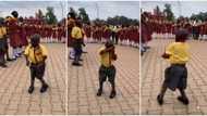 Shy little schoolboy causes stir in school, whines waist like a lady as he dances in front of students in clip