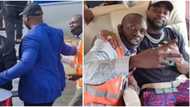 Davido invites airport staff into his jet, takes photo with him moments after bodyguard pushed him away