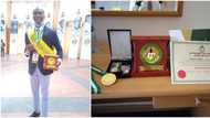 Young man receives award from President Buhari, gets automatic employment, scholarship, photos stirs reactions